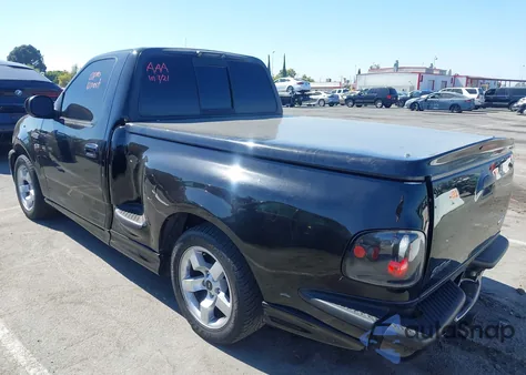 2002 Ford F-150 Lightning z USA, uszkodzony, nr VIN 2FTZF07392CA61316